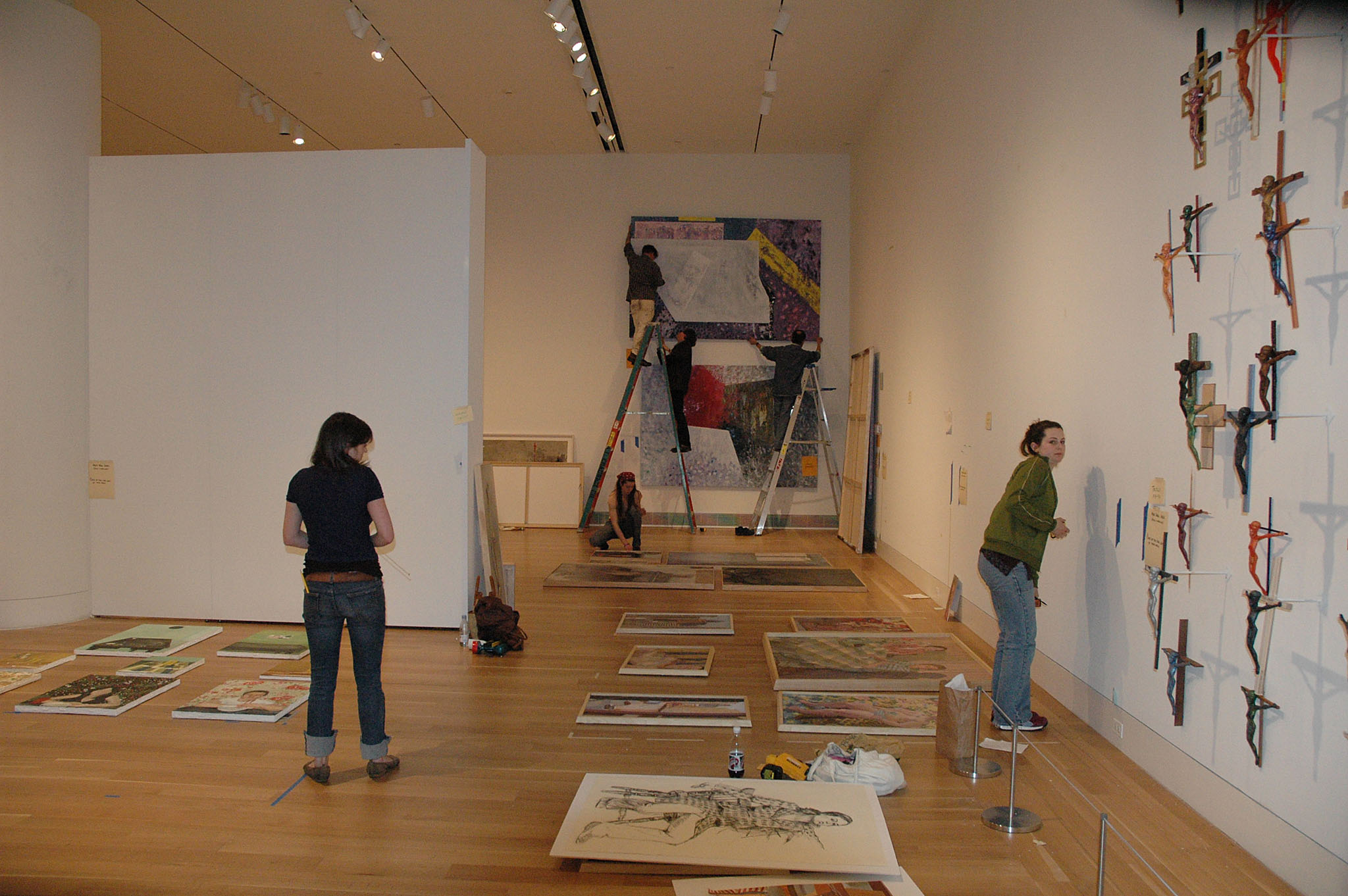 
Students installing works of art for the 104th Annual Student Exhibition